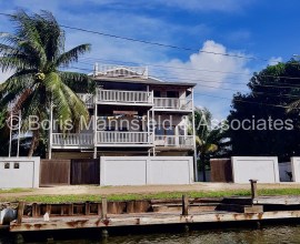 NH418 - Delightful 3 Story Harbor Place House For Sale - Placencia Village