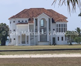 NH465 - Unfinished House For sale In The Upscale Placencia Residences